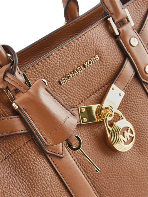 is michael kors cheaper in us than uk|who bought michael kors.